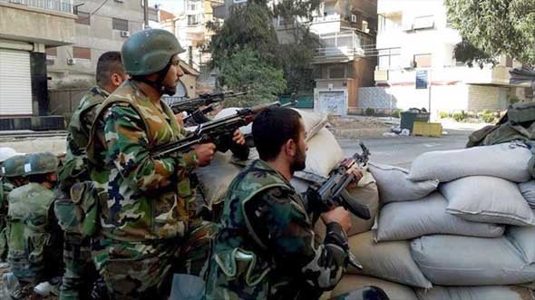 Syriska arméstyrkor befriar strategiskt område utanför Damaskus