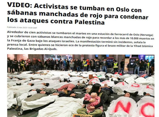 Video/Oslo Centralstation: Hundra personer i rödfläckade lakan på golvet på Oslo Centralstation i solidaritet med PALESTINA!